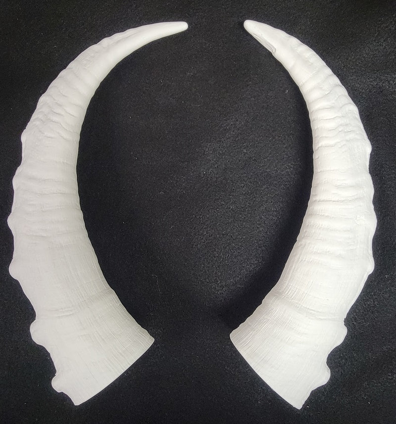 Plastic Opaque Caucasian tur Antelope Horns